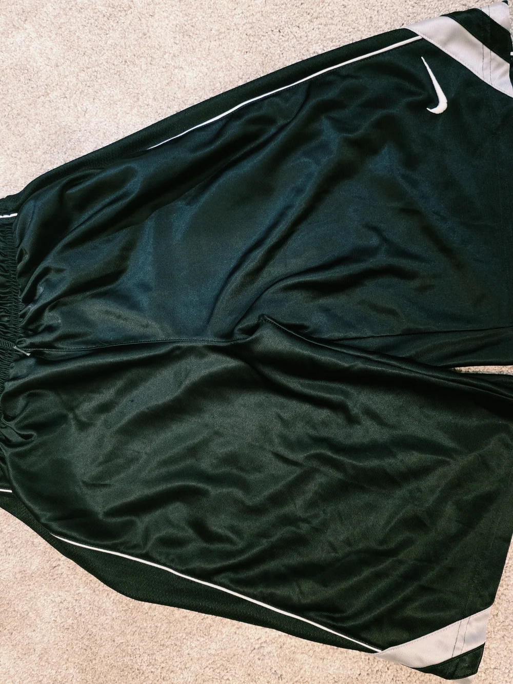 Nike Boy’s 10 Black Athletic Shorts with White Trim